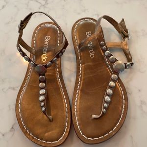 Bernardo size 8 tan leather sandals. Trim is round metal buttons on the leather.